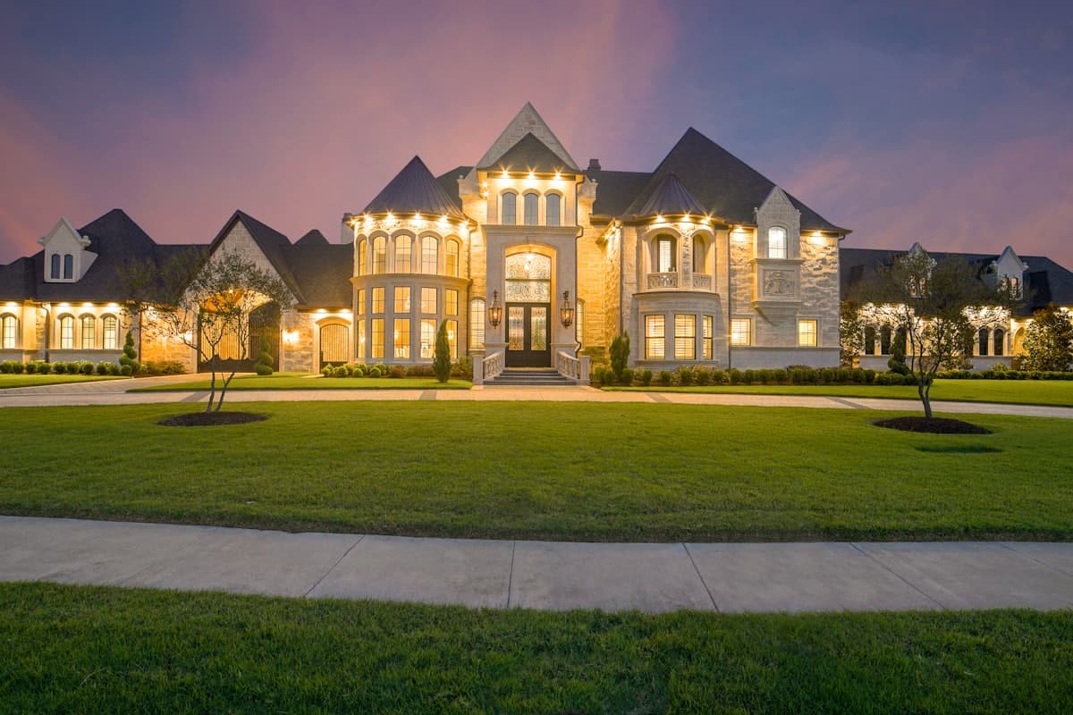A custom-built home at dusk